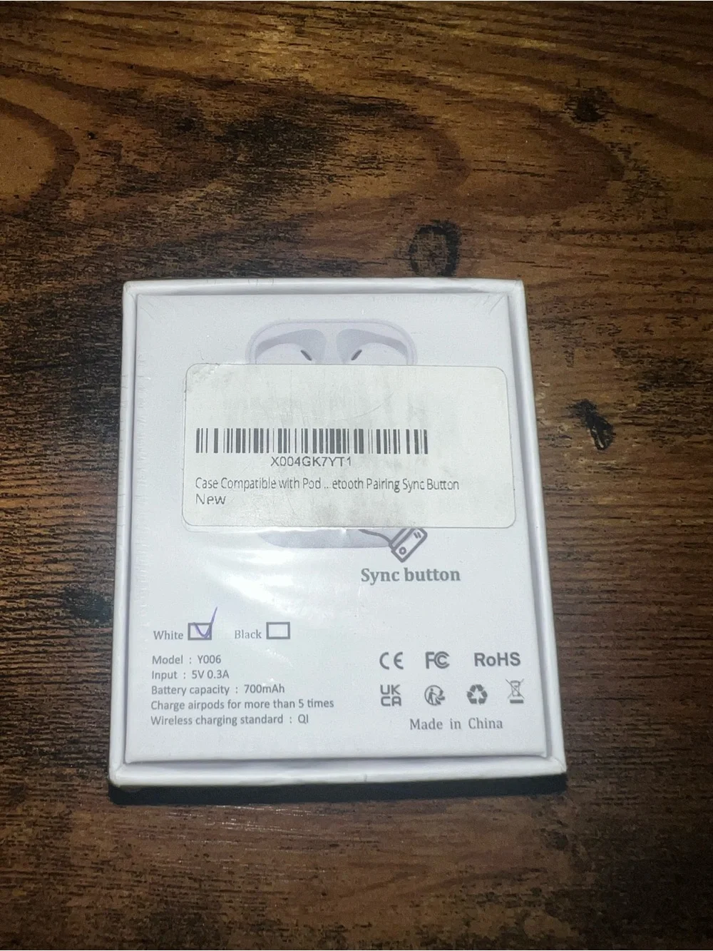 White AirPods Charging Case in Packaging